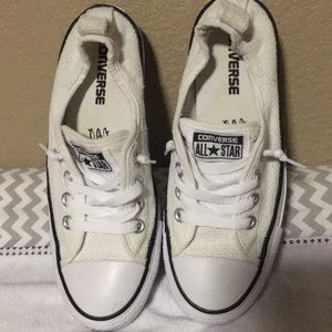 White converse all star shoes.